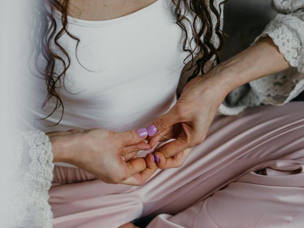 Close-up of a person meditating with focus on calm breathing.
